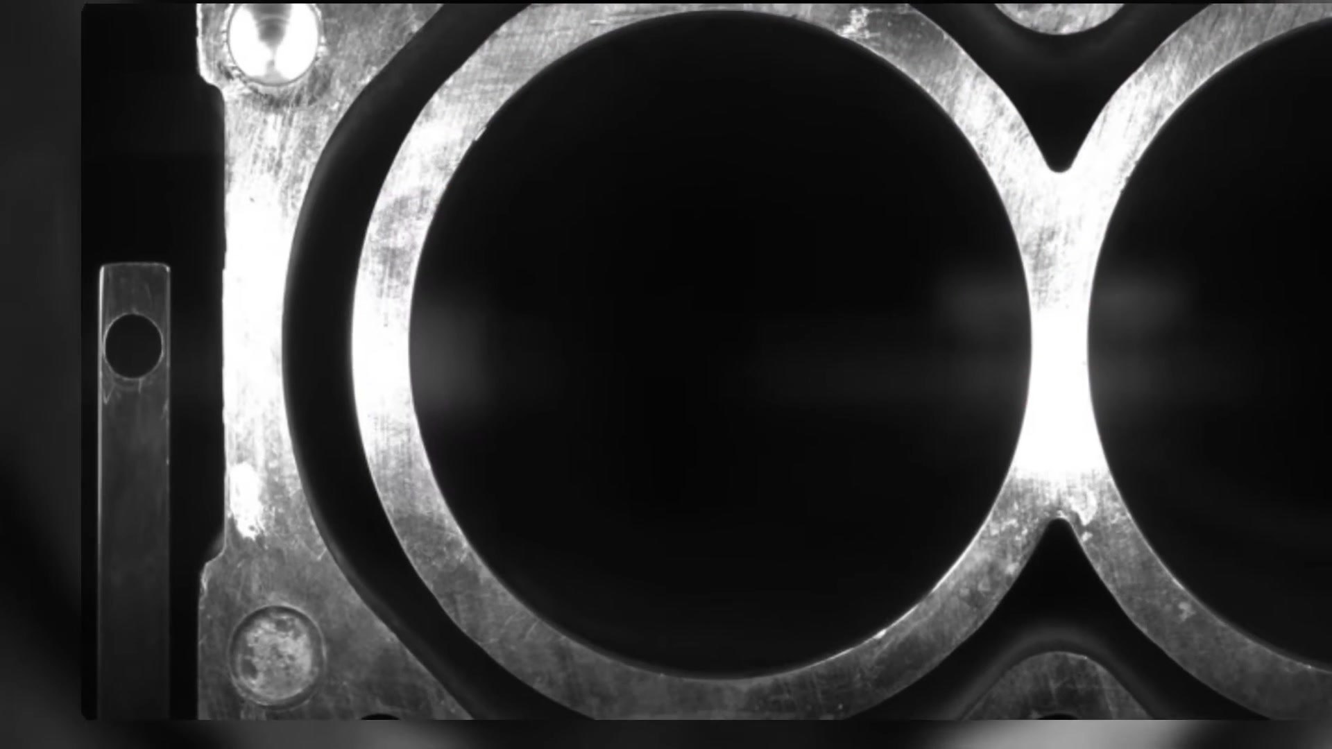 Detail of the line-scan image showing the deck face around a cylinder bore