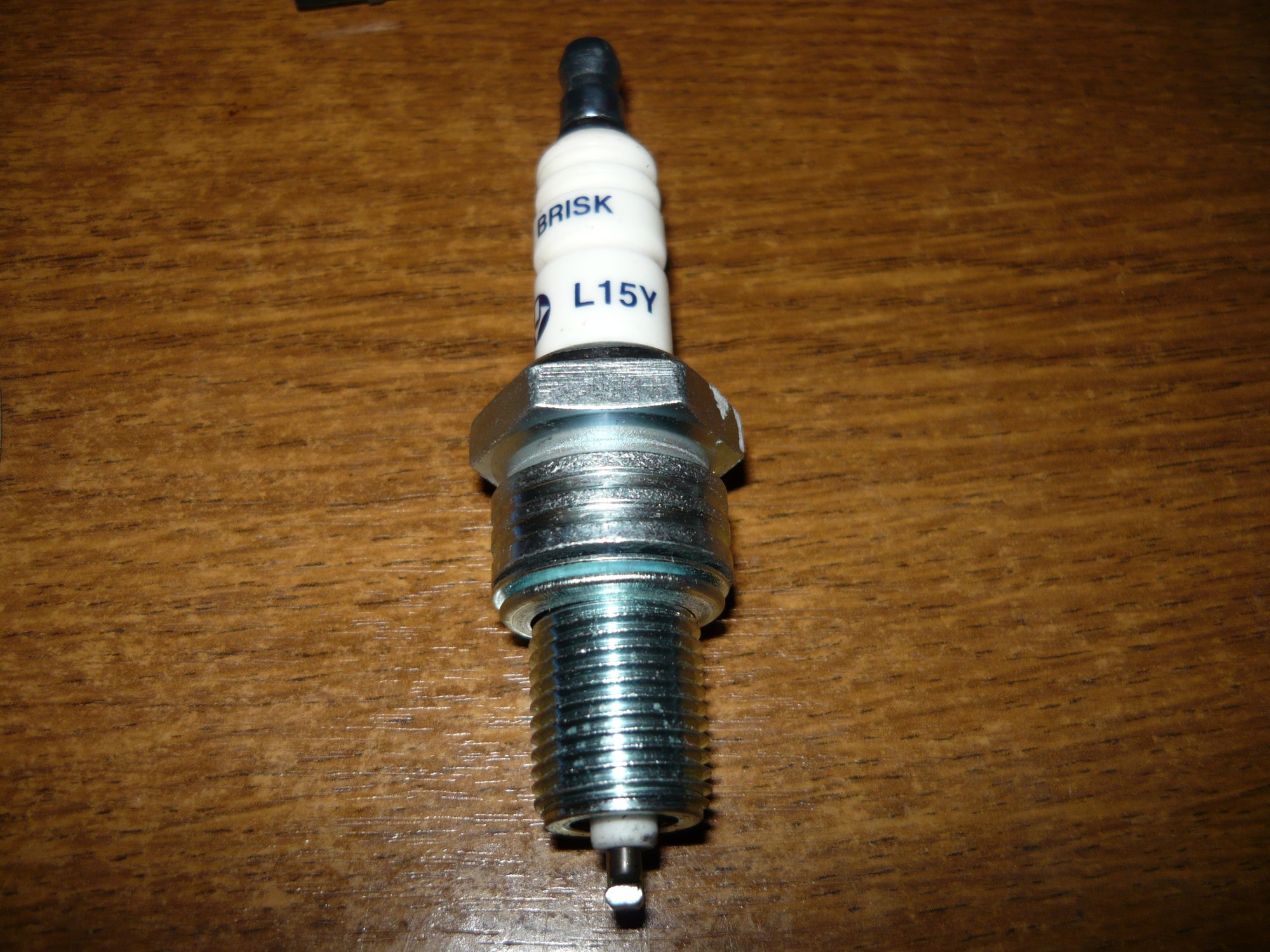 Spark-Plug Measurement, Marking and Sorting in One Cell